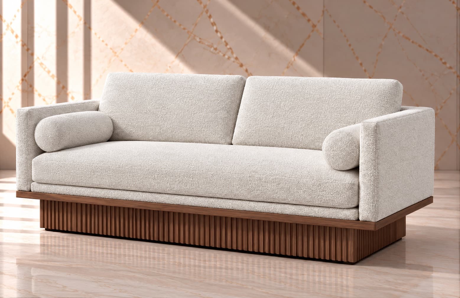 The hand-fluted solid walnut plinth of the Marlowe sofa