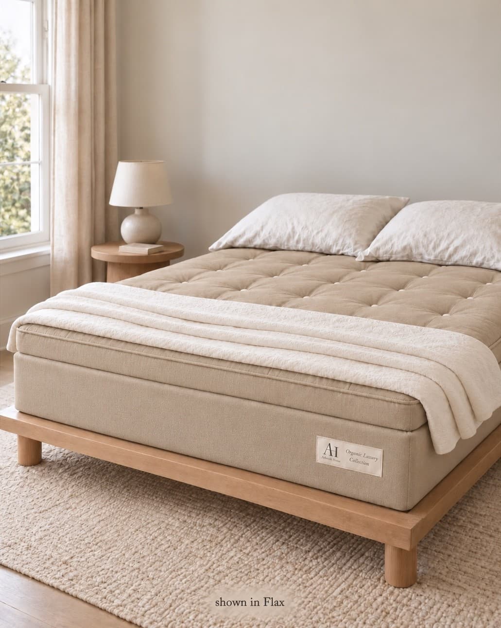 The Ashbury in Flax, shown in a sunlit bedroom.